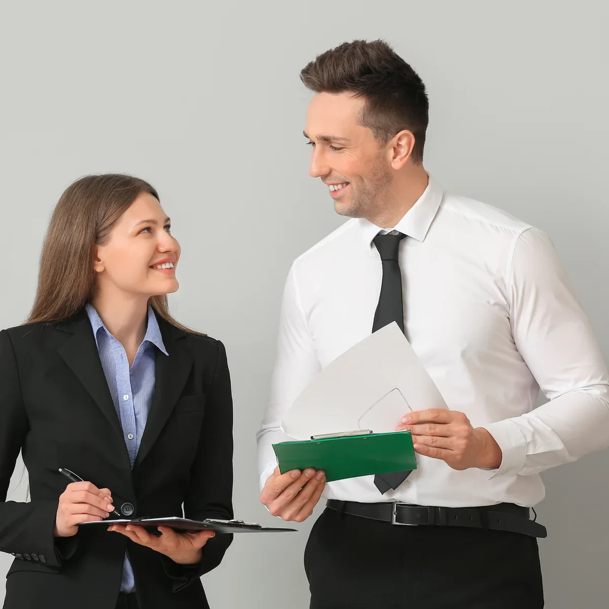 Colleagues reviewing a document.